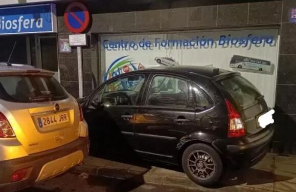 Driver crashes into driving school