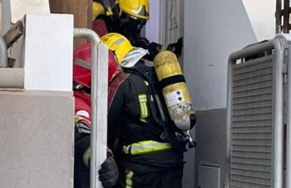 Firefighters extinguish fire in squat