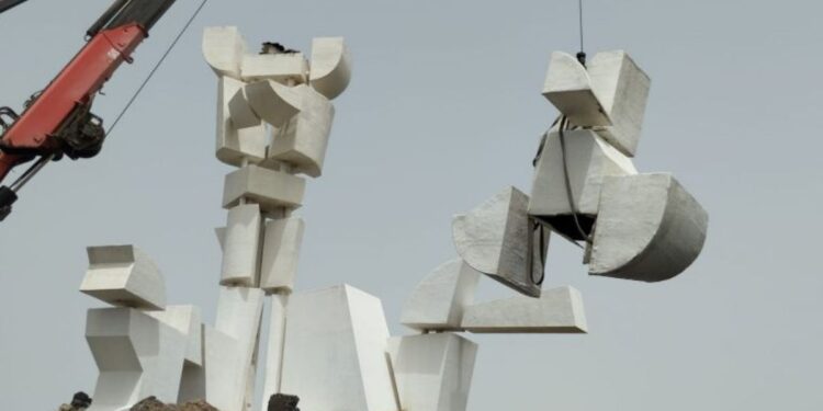 Manrique sculpture in repair after wind damage