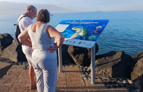 Marine life information boards in Playa Blanca