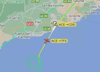 Plane diverts after minor falls unconscious