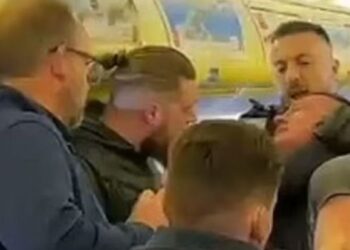 Rowdy passenger arrested