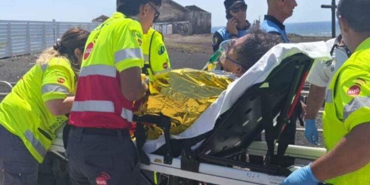 Arrecife local police and citizen rescue swimmer